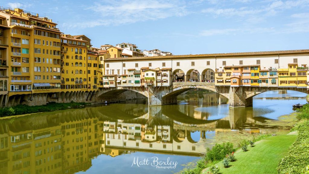 The Ponte Vecchio bridge is located in Florence, Italy and spans across the River Arno