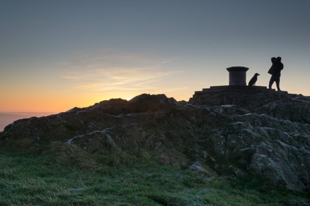 Man photographs dog at the Worcestershire Beacon