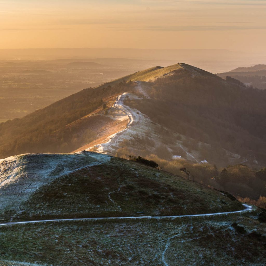 The view from the Worcestershire Beacon looking towards Wyche cutting during a Malvern Hills sunrise